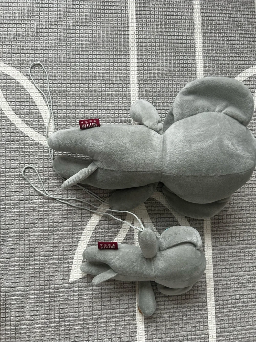 Animal curtain hold backs